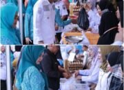 Wabup dan Ketua TP PKK Takalar Hadiri ki Gerakan Pangan Murah di Desa Pattopakang