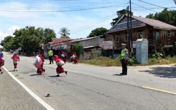 Jaga Keamanan dan Ketertiban, Polantas Polda Sulbar Lakukan Pengaturan dan Edukasi Lalu Lintas Menyeluruh di SD Inpres Auni Kalukku